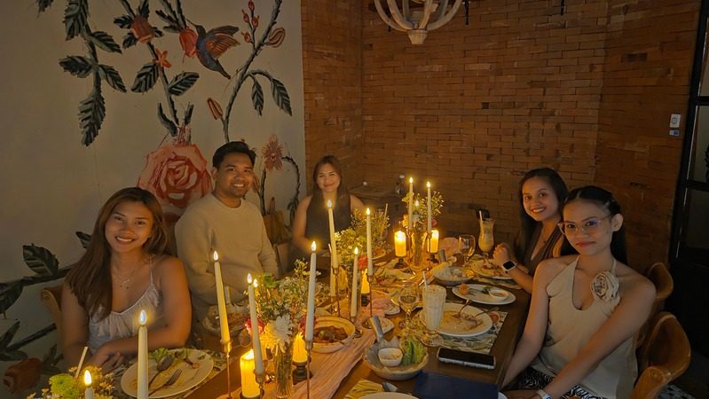 Group photo at a dinner gathering